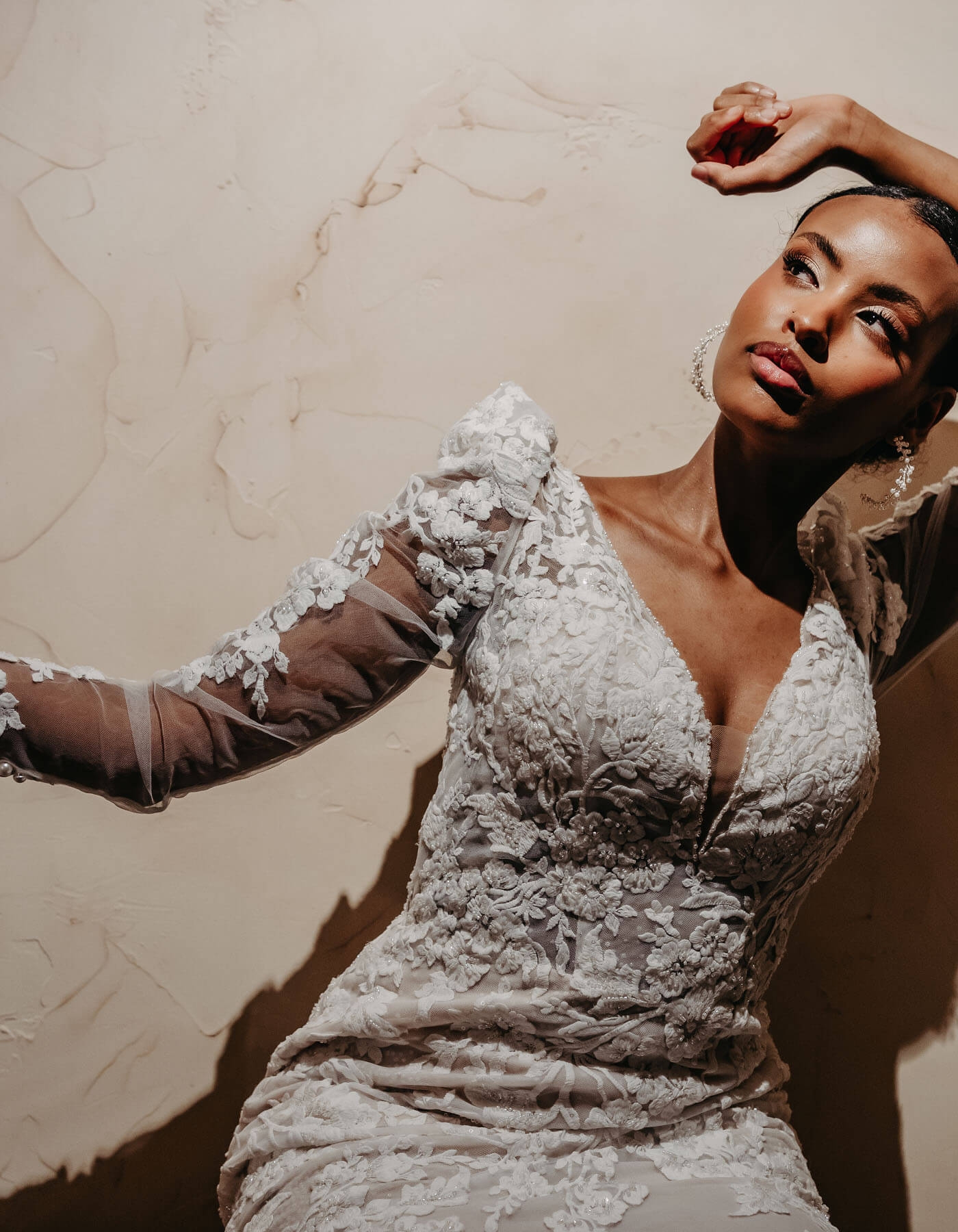 Model wearing a white dress